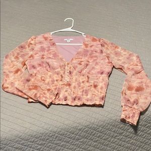 Slim blouse with variations of pink